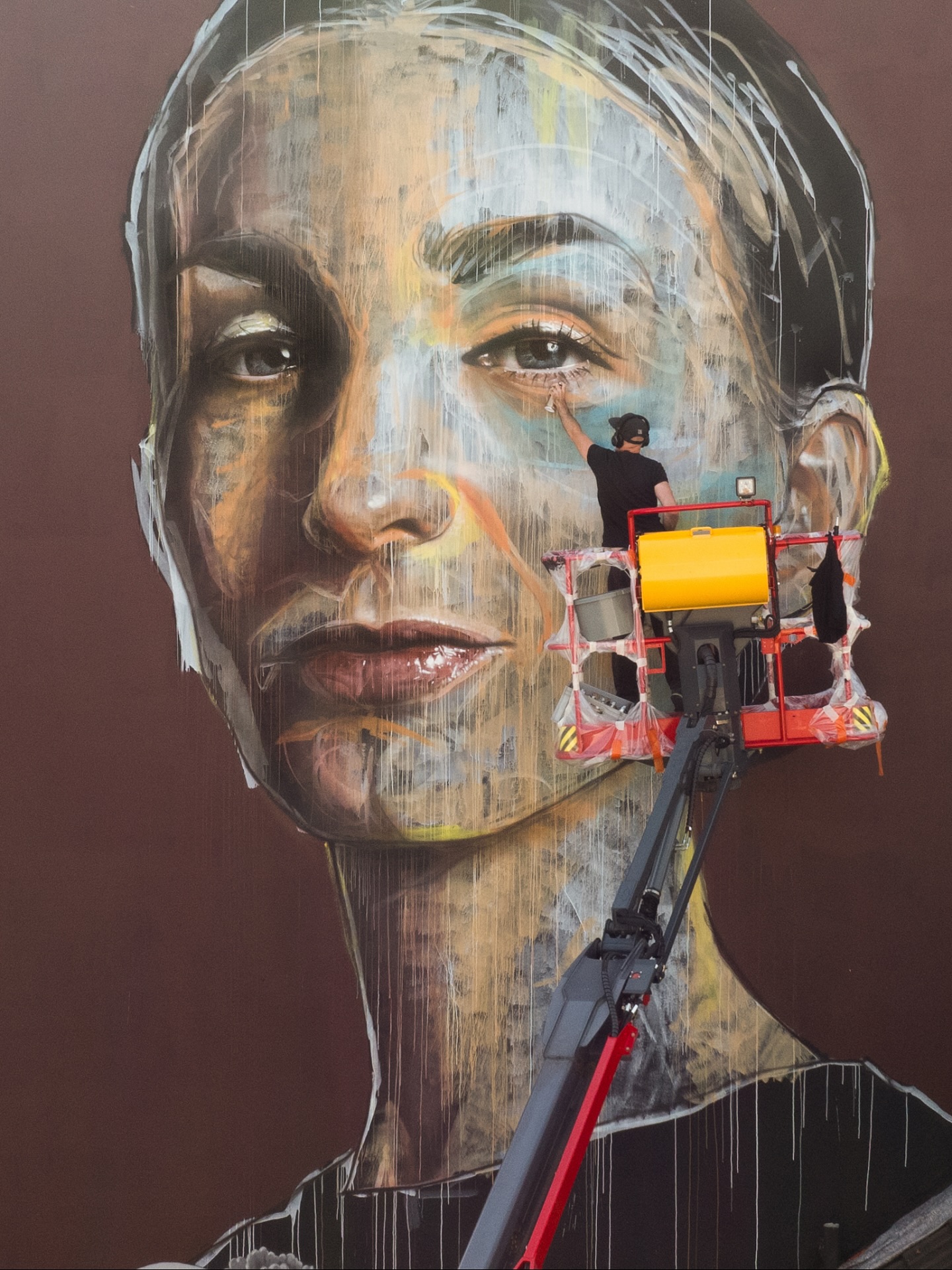 In the middle of painting a large-scale portrait of Pina Bausch in Wuppertal, invited by the wonderful team of @urbaner_kunstraum_wuppertal as part of the @wuppertal_tanzt project.

A festival like this truly thrives when there is a host who puts heart and soul into it, and that is exactly what I found here. I am grateful for the perfect working conditions and the chance to fully dive into the process.

The mural has just been completed, and very soon I will share the full wall with details and more making-of impressions.

Big thanks to my wife @schusa for her constant support, mentally, on-site and with her invaluable input.
And thanks to @collab.cologne for capturing these amazing shots.

#akut #pinaBausch #wuppertal_tanzt #wuppertal #urbaner_kunstraum_wuppertal
#mural #muralpainting #portraitmural #muralart #muralsdaily #wallart #publicart #artinpublicspaces
#streetart #urbanart #streetartdaily #streetarteverywhere #urbanartist #urbancontemporary #streetartcommunity #urbanwalls
#contemporaryart #modernart #artlovers #artwatchers #artofvisuals #creativecommunity #artspotlight #artoftheday